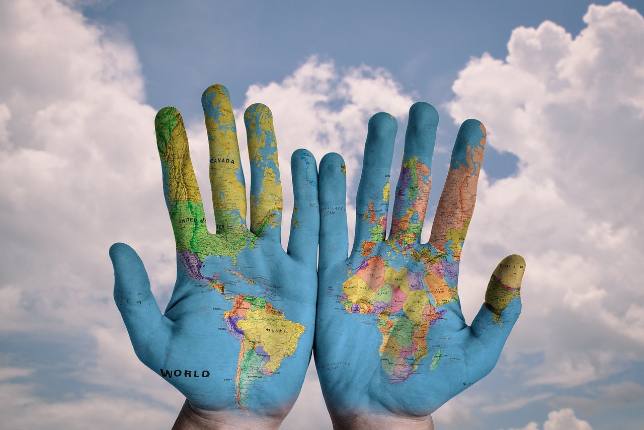 Welt Hände Globalisierung Outsourcing und Nachhaltigkeit Lässt sich das verbinden